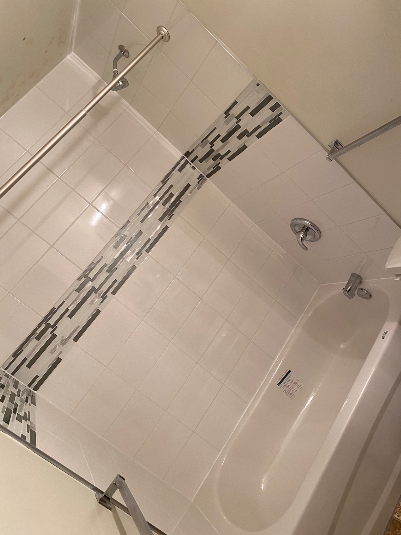 Shower with accent stripe